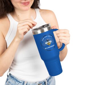 Person in a white tank top holds a 40oz "Can You Use It in a Sentence" Bee Inspired Insulated Travel Mug featuring text and a honeycomb design.
