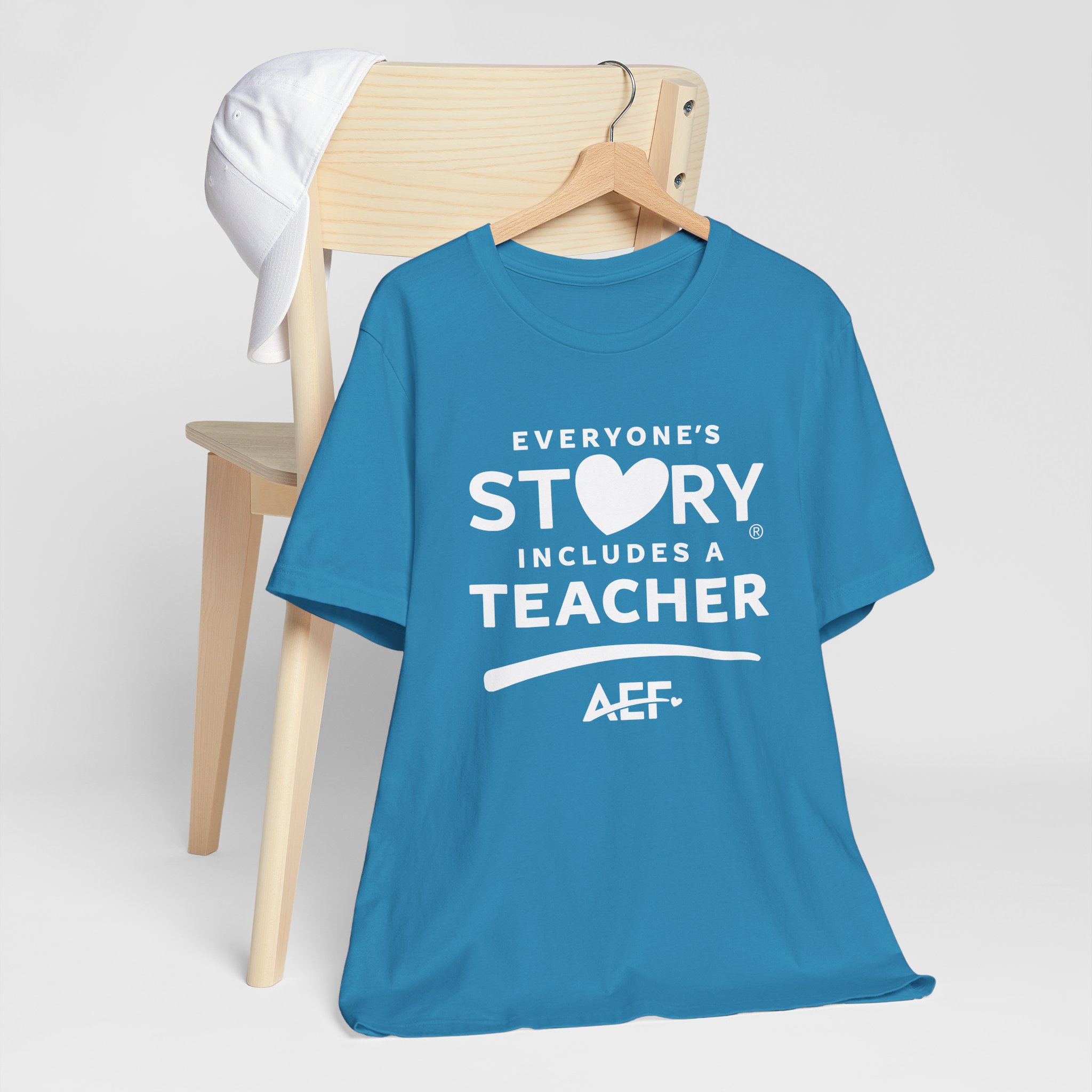 Everyone's Story Includes a Teacher T-Shirt - Unisex - Image 7